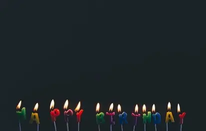 Candles spelling out happy birthday