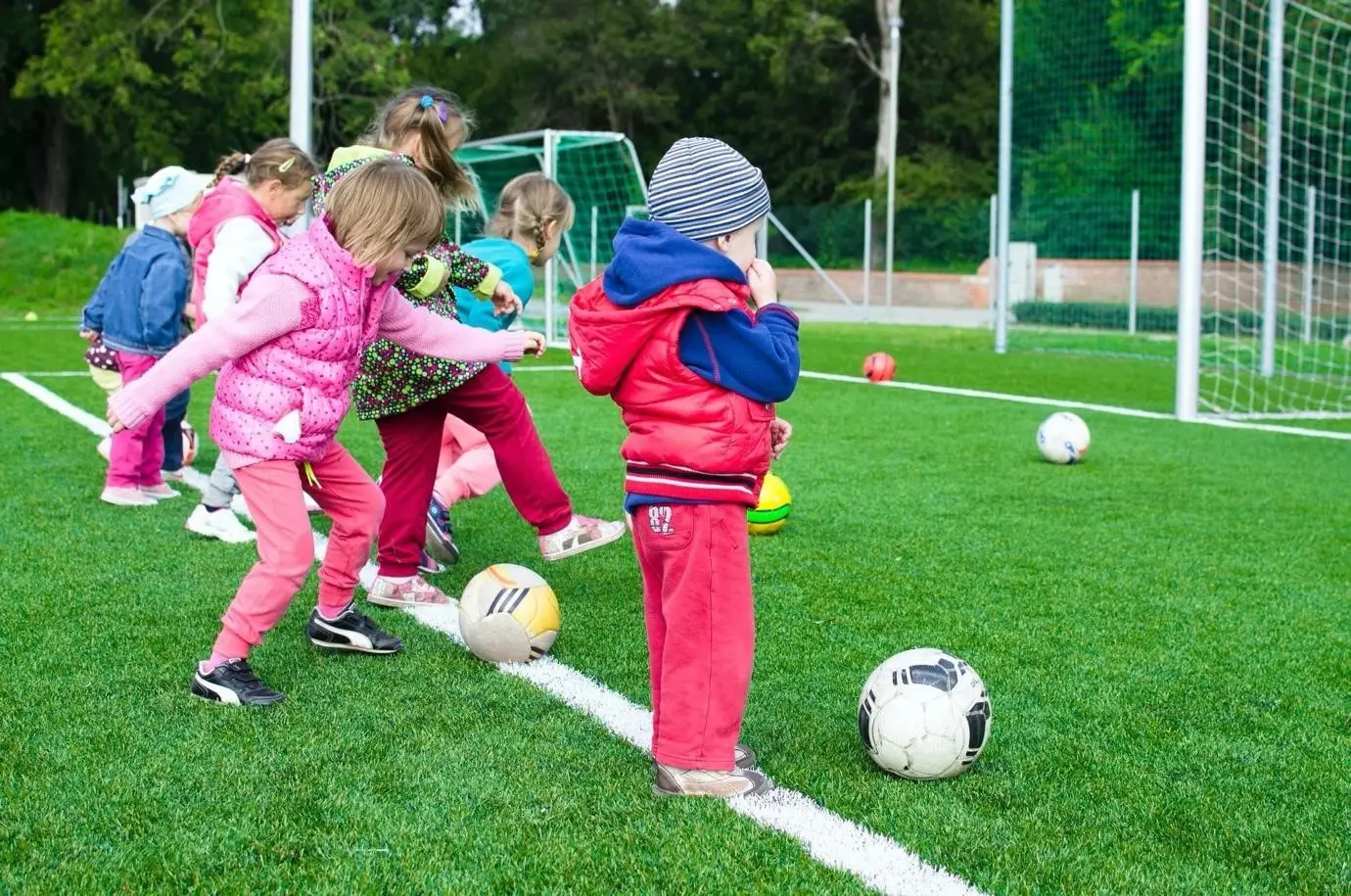 kids playing with a soccer ball
