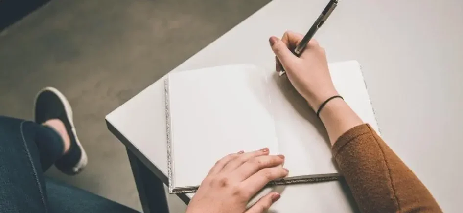 Woman taking notes