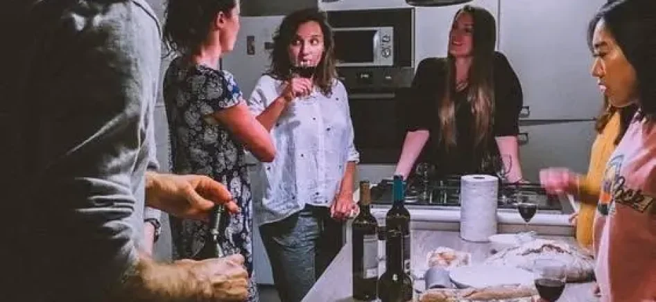 a group of friends talking over dinner
