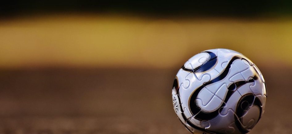 a soccer ball on the ground-min