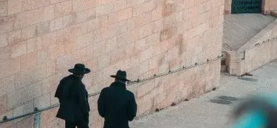 two-men-talking-Hebrew-greeting-min