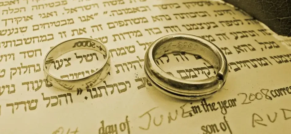 Wedding rings on ketubah contract