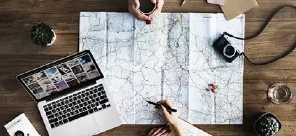 People making travel plans using the map